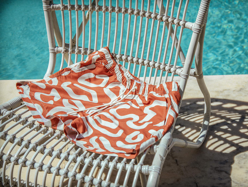 Pétrone short bain polyester recyclé graphique rouille homme#couleur_graphique-écru---rouille