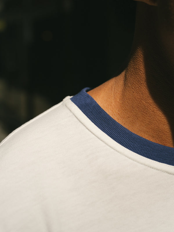 Pétrone T-shirt homme varsity contrasté blanc crème bleu marine coton biologique Tencel Lyocell#couleur_bleu-marine-/-blanc-crème